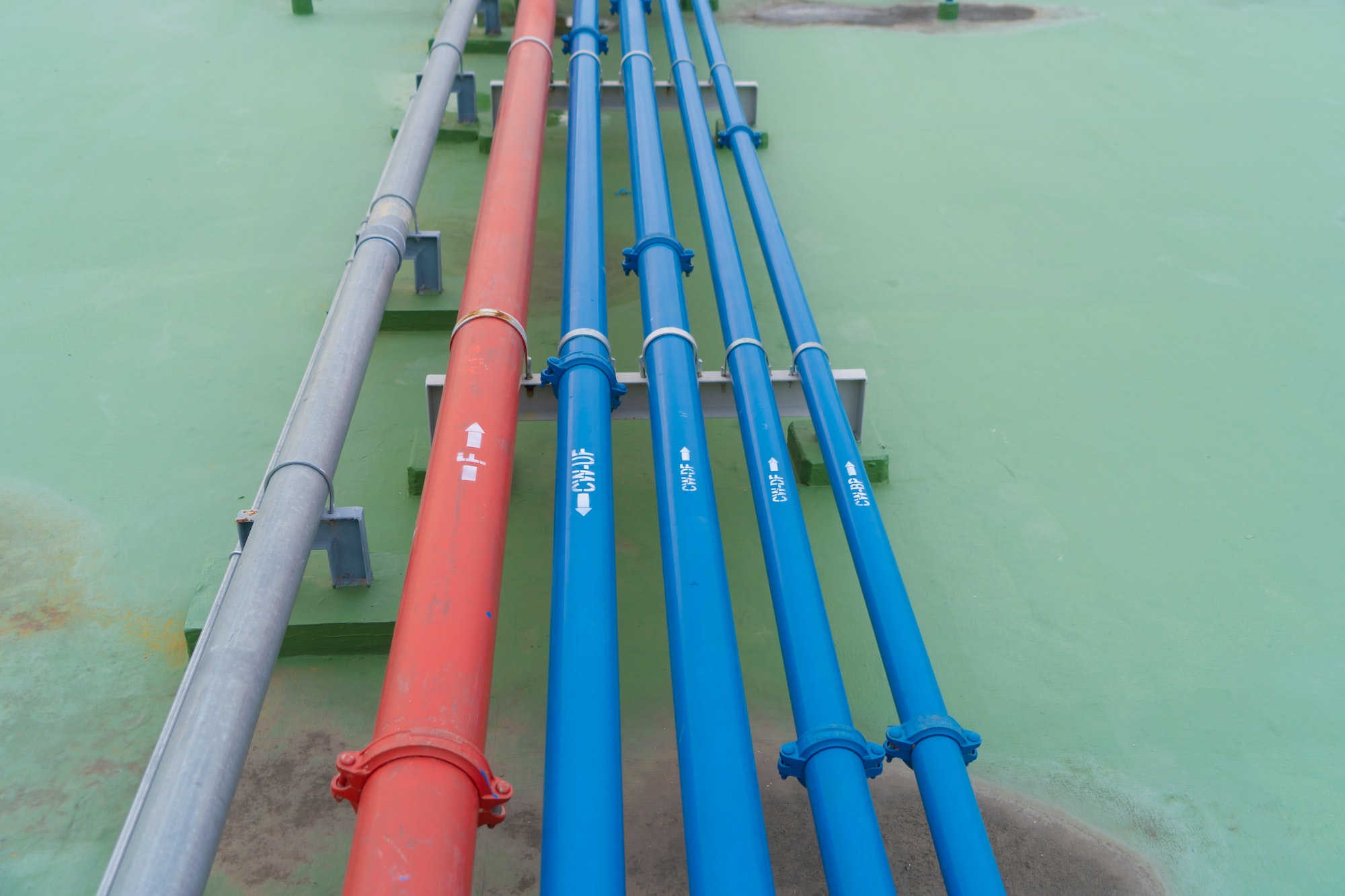 Industry factory. Cooling tower in building. System work machine. Water Supply and return pipe lines